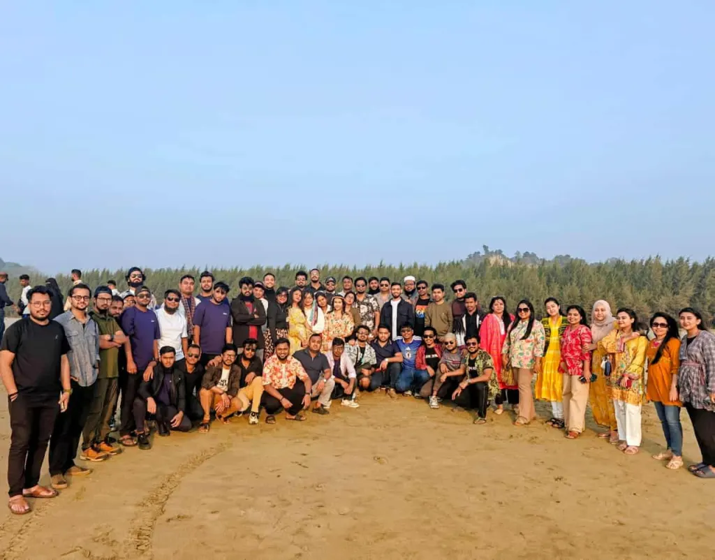 The team on the beach during a company trip