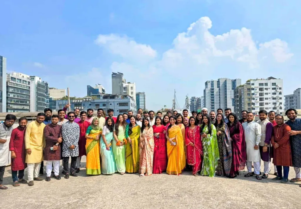 The Innospace team in traditional dress on the office rooftop